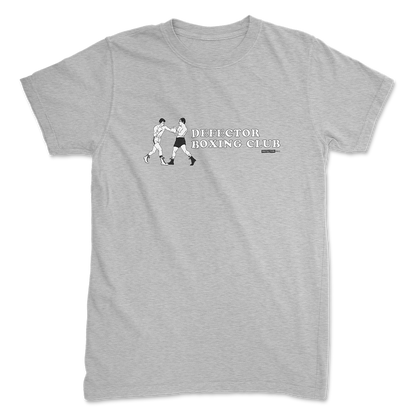 Defector shirt that says “DEFECTOR BOXING CLUB.” Features clip art of boxers.  Grey shirt in ‘unisex’ cut.