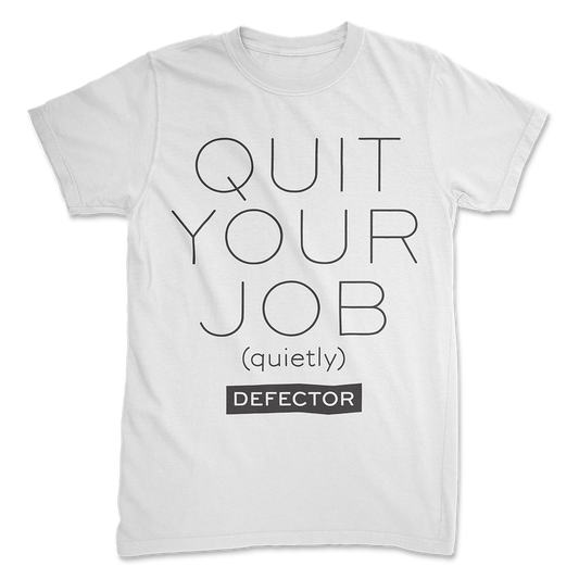 A white shirt that says QUIT YOUR JOB (quietly) with the Defector logo below that. Print is oversized.
