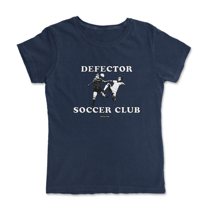 Defector shirt that says “DEFECTOR SOCCER CLUB.” Features clip art of soccer players.  Blue shirt in ‘femme’ cut.